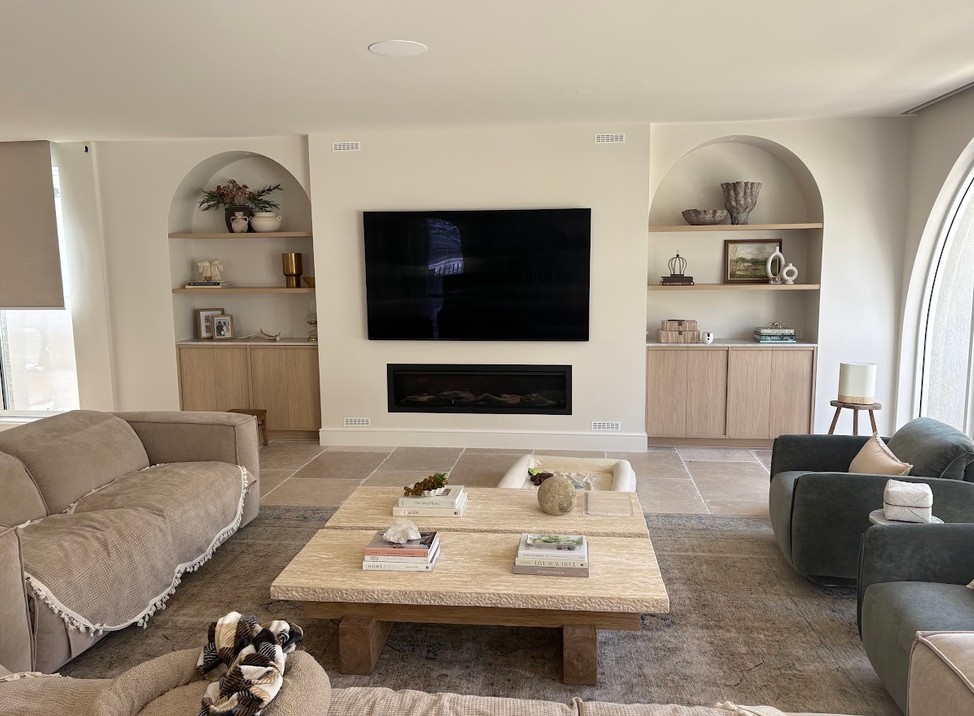 Renovated older home showing fresh wall linings and a decorative ceiling brought back to life