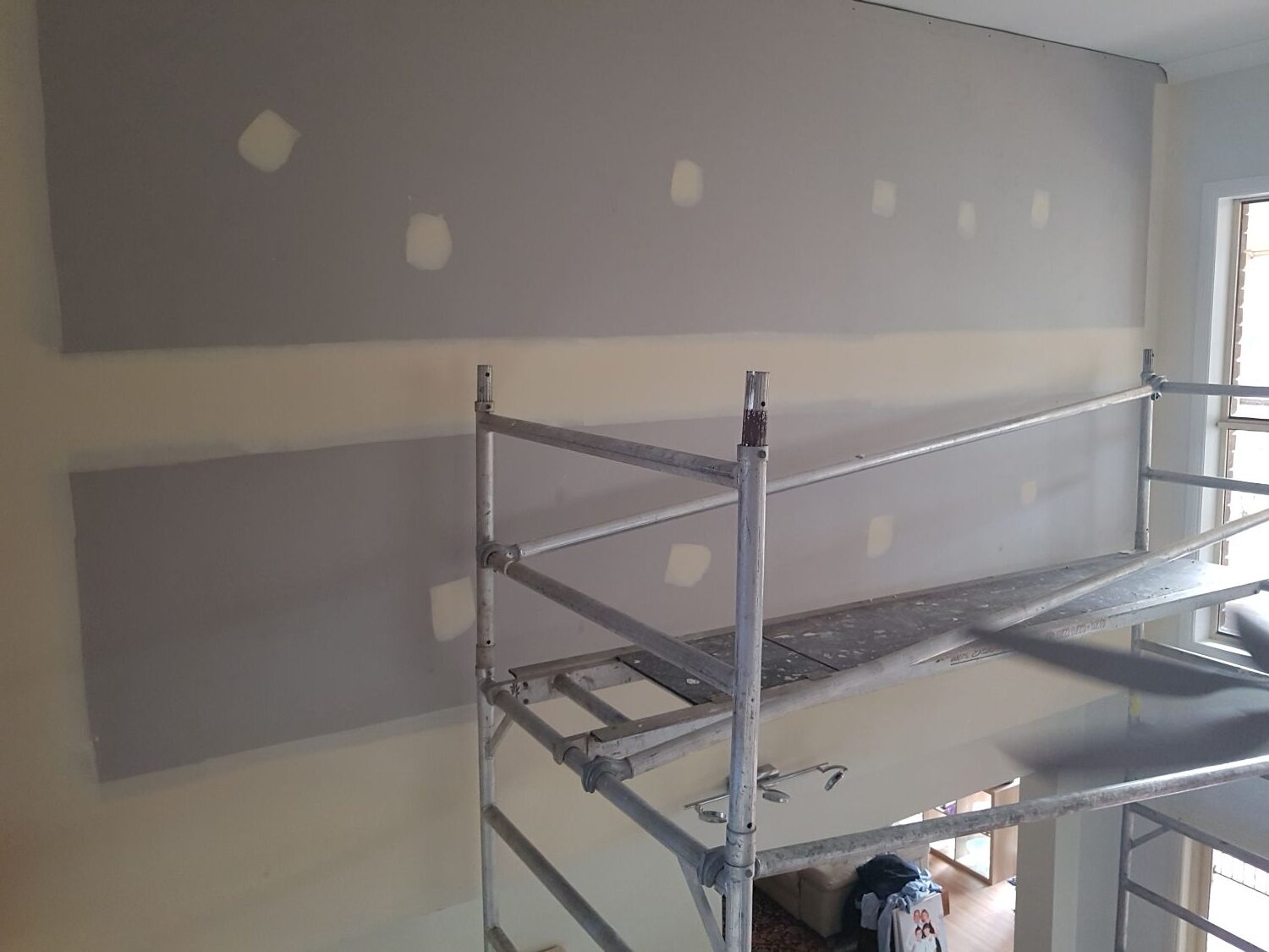 Freshly lined plasterboard walls and ceiling during a home renovation